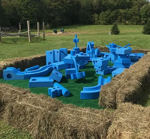 Large Blue Building Blocks in field