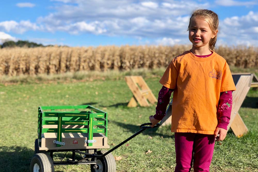 girl pulling wagon