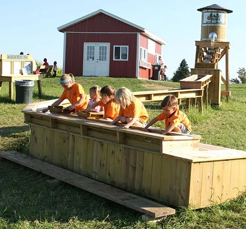 Group of kids at the gem mining activity on Ellms Farm